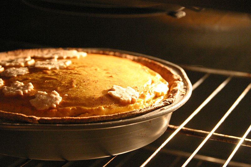 Pumpkin pie with maple leaf decoration baking, October 2006