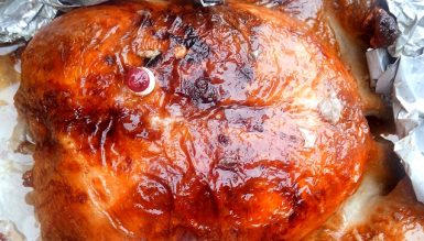 Chester assado no suco de laranja