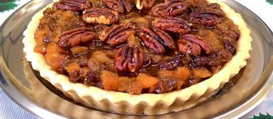 Torta natalina de figos, tâmaras e damascos com nozes pecan ao mel